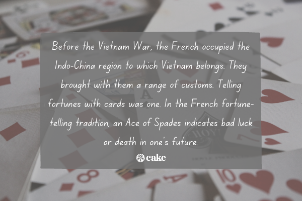 Text about why the ace of spades is called the death card over an image of playing cards