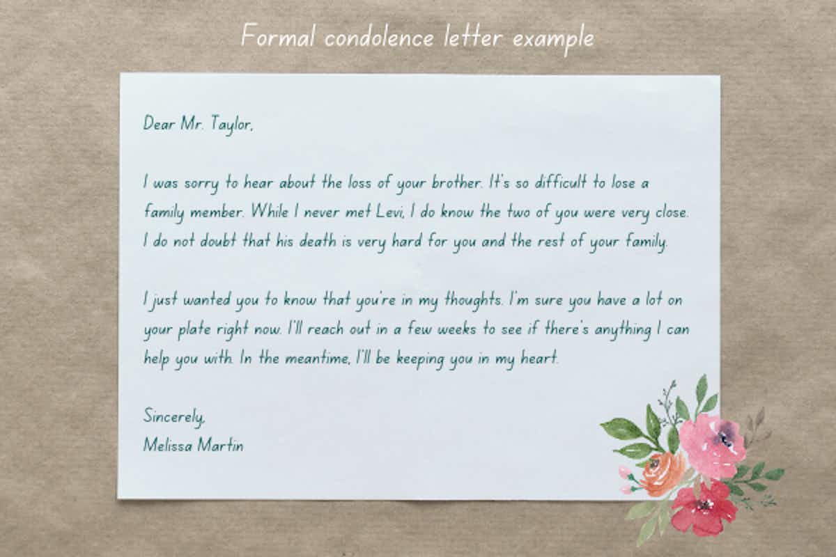 Example of a formal condolence letter with an image of a sheet of paper and flowers and leaves