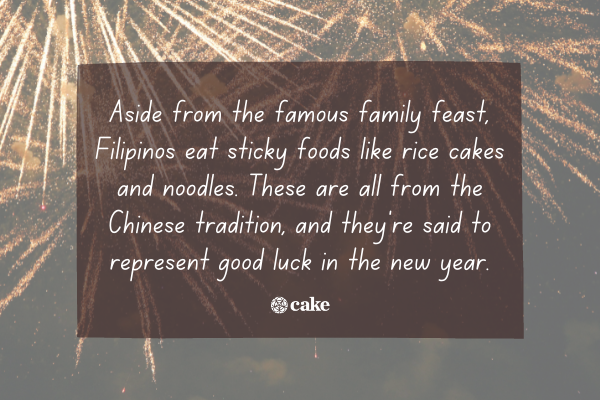 Text about Filipinos eating sticky foods to celebrate the new year over an image of fireworks
